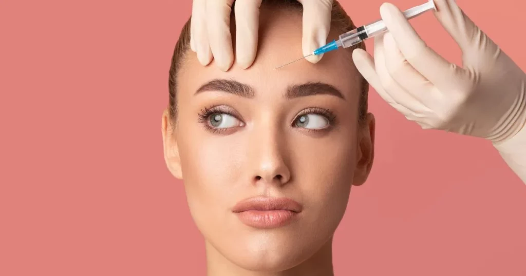 Beautiful woman receiving neuromodulators treatment in her forehead in Richmond, KY